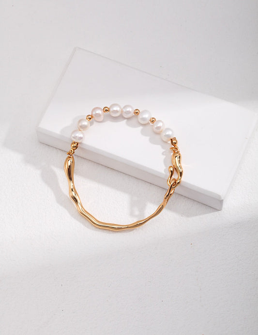 Pulsera de oro con perlas de agua dulce – Elegancia artesanal para un estilo único