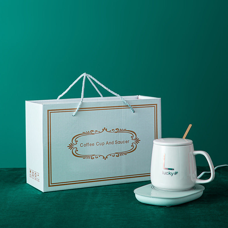 "Smart Ceramic Mug with Heater - Luxury Gift for Coffee and Tea"